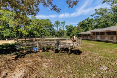 There's a rhythm to life in Lake Forest that locals know by on Lake Forest Yacht and Country Club in Alabama - for sale on GolfHomes.com, golf home, golf lot
