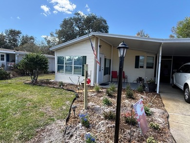 This updated, clean home is coming mostly furnished and is ready on Whisperwood Golf Course in Florida - for sale on GolfHomes.com, golf home, golf lot