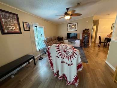 This updated, clean home is coming mostly furnished and is ready on Whisperwood Golf Course in Florida - for sale on GolfHomes.com, golf home, golf lot