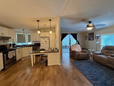 This updated, clean home is coming mostly furnished and is ready on Whisperwood Golf Course in Florida - for sale on GolfHomes.com, golf home, golf lot