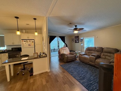 This updated, clean home is coming mostly furnished and is ready on Whisperwood Golf Course in Florida - for sale on GolfHomes.com, golf home, golf lot