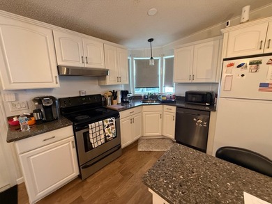 This updated, clean home is coming mostly furnished and is ready on Whisperwood Golf Course in Florida - for sale on GolfHomes.com, golf home, golf lot