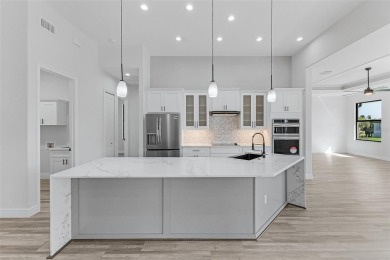 Discover this stunning new construction pool home in the on Burnt Store Golf Club in Florida - for sale on GolfHomes.com, golf home, golf lot