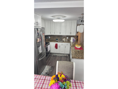 YOU WILL LOVE THIS PLACE! Cozy, clean, and modern condo in on Hillsboro Pines Golf in Florida - for sale on GolfHomes.com, golf home, golf lot