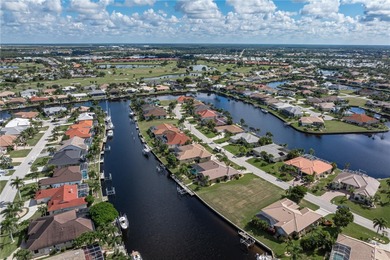 VACANT, WATERFRONT LOT IN BURNT STORE ISLES - This oversized on Twin Isles Country Club in Florida - for sale on GolfHomes.com, golf home, golf lot