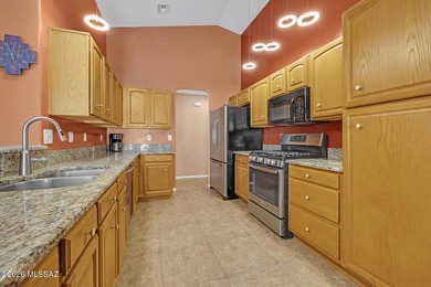 Located in the golf community of Tucson National, this 2BD/2BA on Omni Tucson National Golf Resort and Spa - Sonoran in Arizona - for sale on GolfHomes.com, golf home, golf lot