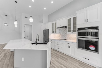 Discover this stunning new construction pool home in the on Burnt Store Golf Club in Florida - for sale on GolfHomes.com, golf home, golf lot