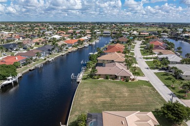 VACANT, WATERFRONT LOT IN BURNT STORE ISLES - This oversized on Twin Isles Country Club in Florida - for sale on GolfHomes.com, golf home, golf lot