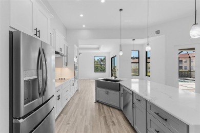 Discover this stunning new construction pool home in the on Burnt Store Golf Club in Florida - for sale on GolfHomes.com, golf home, golf lot