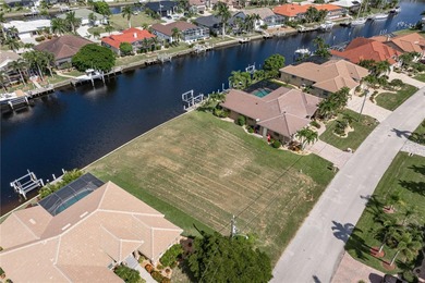 VACANT, WATERFRONT LOT IN BURNT STORE ISLES - This oversized on Twin Isles Country Club in Florida - for sale on GolfHomes.com, golf home, golf lot