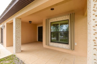 Very solid concrete block home with metal roof and accordion on Spanish Lakes I in Florida - for sale on GolfHomes.com, golf home, golf lot