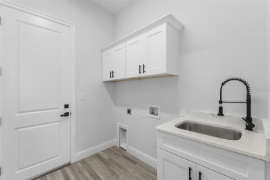 Discover this stunning new construction pool home in the on Burnt Store Golf Club in Florida - for sale on GolfHomes.com, golf home, golf lot