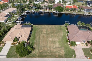VACANT, WATERFRONT LOT IN BURNT STORE ISLES - This oversized on Twin Isles Country Club in Florida - for sale on GolfHomes.com, golf home, golf lot