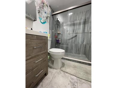 YOU WILL LOVE THIS PLACE! Cozy, clean, and modern condo in on Hillsboro Pines Golf in Florida - for sale on GolfHomes.com, golf home, golf lot