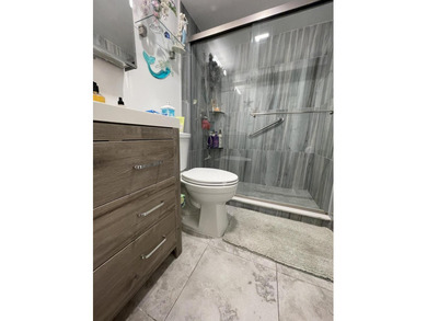 YOU WILL LOVE THIS PLACE! Cozy, clean, and modern condo in on Hillsboro Pines Golf in Florida - for sale on GolfHomes.com, golf home, golf lot