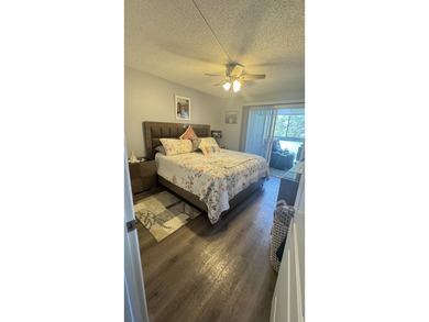 YOU WILL LOVE THIS PLACE! Cozy, clean, and modern condo in on Hillsboro Pines Golf in Florida - for sale on GolfHomes.com, golf home, golf lot