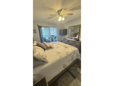 YOU WILL LOVE THIS PLACE! Cozy, clean, and modern condo in on Hillsboro Pines Golf in Florida - for sale on GolfHomes.com, golf home, golf lot