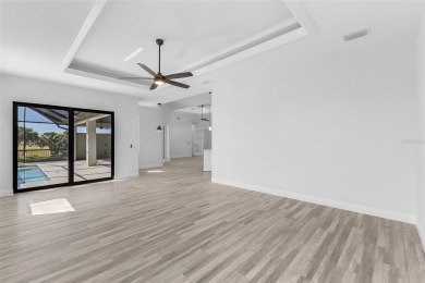 Discover this stunning new construction pool home in the on Burnt Store Golf Club in Florida - for sale on GolfHomes.com, golf home, golf lot