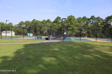 1.02-acre wooded lot in Boiling Spring Lakes, offering a on The Lakes Country Club in North Carolina - for sale on GolfHomes.com, golf home, golf lot