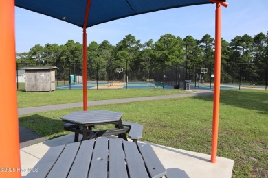 1.02-acre wooded lot in Boiling Spring Lakes, offering a on The Lakes Country Club in North Carolina - for sale on GolfHomes.com, golf home, golf lot