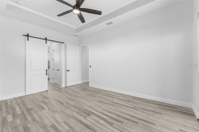 Discover this stunning new construction pool home in the on Burnt Store Golf Club in Florida - for sale on GolfHomes.com, golf home, golf lot