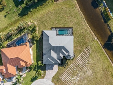 Discover this stunning new construction pool home in the on Burnt Store Golf Club in Florida - for sale on GolfHomes.com, golf home, golf lot