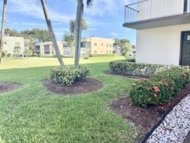 Great Location! True 1st floor with fabulous canal view on side on Kings Point Golf -Flanders Way in Florida - for sale on GolfHomes.com, golf home, golf lot