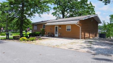 Check out this Osage Beach package: Darling home with Lakeview for sale on GolfHomes.com