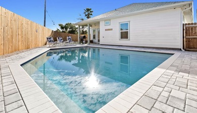 Located 1/2 MILE from sugar white sand beaches and pristine on Sharks Tooth Golf Club in Florida - for sale on GolfHomes.com, golf home, golf lot
