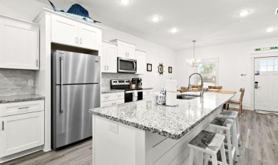 Located 1/2 MILE from sugar white sand beaches and pristine on Sharks Tooth Golf Club in Florida - for sale on GolfHomes.com, golf home, golf lot