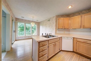 Welcome to 2692 Mulligan, a serene retreat nestled along Hole 7 on Country Club of Jackson in Michigan - for sale on GolfHomes.com, golf home, golf lot