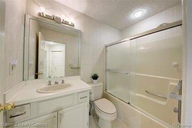 Welcome to 2692 Mulligan, a serene retreat nestled along Hole 7 on Country Club of Jackson in Michigan - for sale on GolfHomes.com, golf home, golf lot