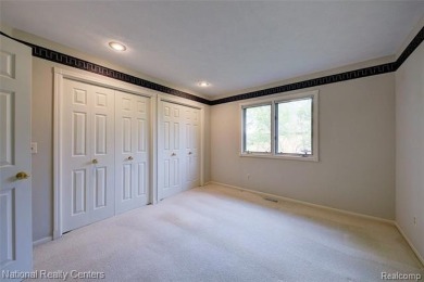 Welcome to 2692 Mulligan, a serene retreat nestled along Hole 7 on Country Club of Jackson in Michigan - for sale on GolfHomes.com, golf home, golf lot