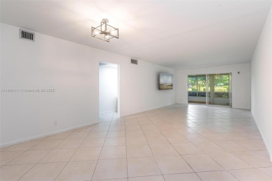 Welcome to this charming 2-bedroom, 2-bathroom condominium on Wynmoor Golf Course in Florida - for sale on GolfHomes.com, golf home, golf lot