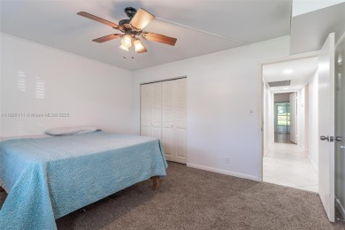 Welcome to this charming 2-bedroom, 2-bathroom condominium on Wynmoor Golf Course in Florida - for sale on GolfHomes.com, golf home, golf lot