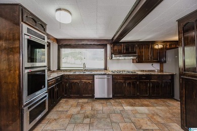 Step back in time in this stately 1915 home rich with timeless on Highland Park Golf Course in Alabama - for sale on GolfHomes.com, golf home, golf lot