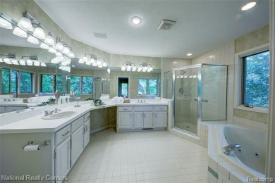 Welcome to 2692 Mulligan, a serene retreat nestled along Hole 7 on Country Club of Jackson in Michigan - for sale on GolfHomes.com, golf home, golf lot