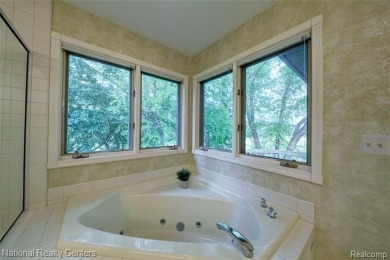 Welcome to 2692 Mulligan, a serene retreat nestled along Hole 7 on Country Club of Jackson in Michigan - for sale on GolfHomes.com, golf home, golf lot