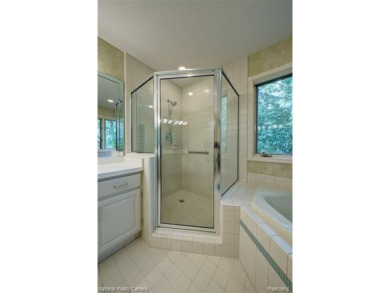 Welcome to 2692 Mulligan, a serene retreat nestled along Hole 7 on Country Club of Jackson in Michigan - for sale on GolfHomes.com, golf home, golf lot