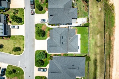 Pristine home on a private perimeter lot featuring 2,430 sq ft on Origins Golf Club in Florida - for sale on GolfHomes.com, golf home, golf lot