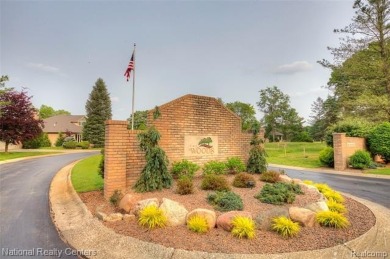 Welcome to 2692 Mulligan, a serene retreat nestled along Hole 7 on Country Club of Jackson in Michigan - for sale on GolfHomes.com, golf home, golf lot