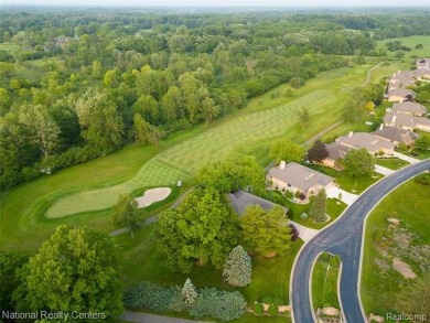 Welcome to 2692 Mulligan, a serene retreat nestled along Hole 7 on Country Club of Jackson in Michigan - for sale on GolfHomes.com, golf home, golf lot