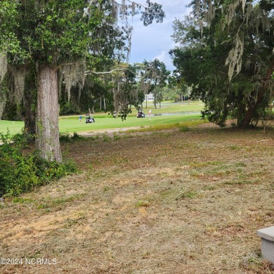 New construction home overlooking Oyster Harbor Golf Course with on Oyster Bay Golf Links in North Carolina - for sale on GolfHomes.com, golf home, golf lot