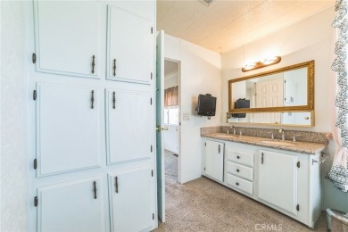 Welcome to this spacious 2-bedroom, 2-bathroom home nestled in a on Oak Valley Golf Club in California - for sale on GolfHomes.com, golf home, golf lot