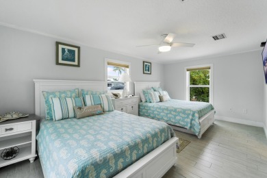 This Key Colony Beach coastal retreat blends modern elegance on Key Colony Beach Golf Course in Florida - for sale on GolfHomes.com, golf home, golf lot