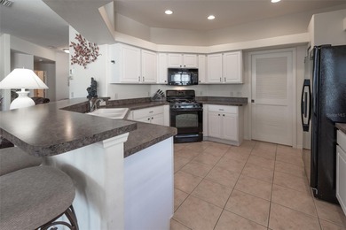 Located on the golf course in the desirable guard gated 55+ on Summerglen Country Club in Florida - for sale on GolfHomes.com, golf home, golf lot