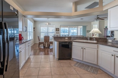 Located on the golf course in the desirable guard gated 55+ on Summerglen Country Club in Florida - for sale on GolfHomes.com, golf home, golf lot