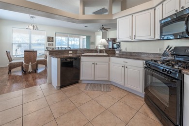 Located on the golf course in the desirable guard gated 55+ on Summerglen Country Club in Florida - for sale on GolfHomes.com, golf home, golf lot