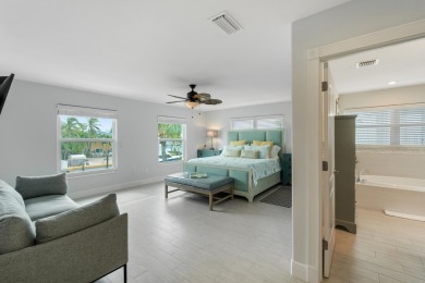 This Key Colony Beach coastal retreat blends modern elegance on Key Colony Beach Golf Course in Florida - for sale on GolfHomes.com, golf home, golf lot