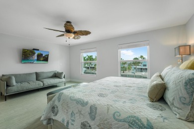 This Key Colony Beach coastal retreat blends modern elegance on Key Colony Beach Golf Course in Florida - for sale on GolfHomes.com, golf home, golf lot